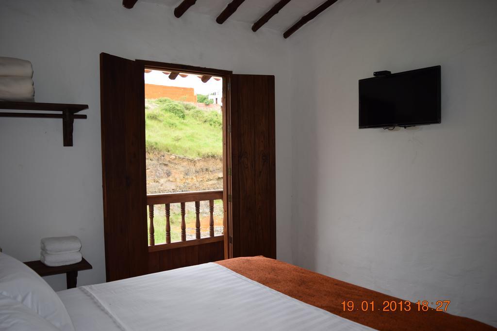 Hotel Casona CHARA Barichara Habitación foto