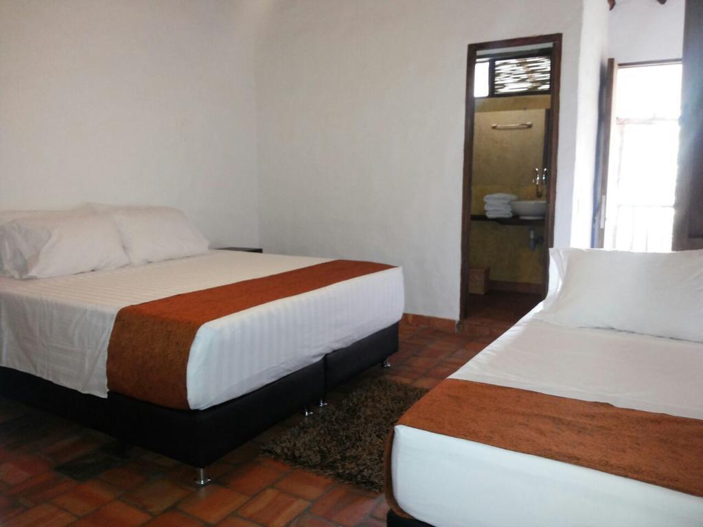 Hotel Casona CHARA Barichara Habitación foto
